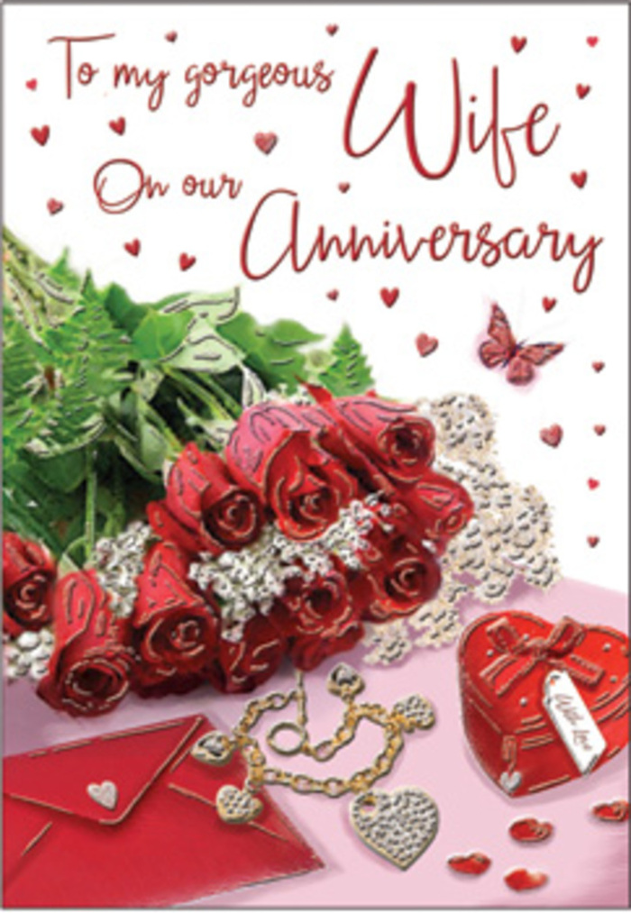 This anniversary card image unfolds as a rich, romantic tableau set against a soft, neutral background that glows with gentle daylight, much like the calm, filtered light spilling into a Raynes Park kitchen on a peaceful morning. In the centre, a lush gathering of red roses draws the eye immediately: each bloom is fully open yet still structured, with layered, velvety petals forming plush, rounded cups of crimson. The roses are framed by sprigs of fresh greenery, their leaves a deep, glossy green that adds depth and contrast, echoing the foliage in the gardens along Coombe Lane. Just beside the floral cluster rests a simple yet elegant envelope, angled slightly as though just placed down after being sealed with a heartfelt note. Nearby, a small red heart-shaped box and a piece of jewellery-perhaps a delicate necklace or charm-are arranged with care, their surfaces catching pinpoints of light that glint like tiny stars. Around them, scattered heart confetti and shimmering decorative accents dance across the card's background, reinforcing the theme of love and celebration without overwhelming the scene. A single butterfly motif flutters close to the roses, introducing a sense of gentle motion and symbolising transformation and the ongoing growth of a relationship. Fine, scripted text curves through the design, complementing the imagery rather than competing with it, suggesting tender anniversary wishes. The textures are almost palpable: the satin smoothness of the petals, the cool touch of metal, the crisp grain of quality card stock. Everything is composed with a quiet elegance, creating an atmosphere that feels both classic and personal-just the sort of refined, heartfelt anniversary sentiment you might receive from a local Raynes Park florist who understands the beauty of long-lasting love.