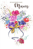 Watercolour-style Mother's Day card illustration showing a joyful bouquet bursting with colour, as if freshly sketched by a local Raynes Park florist between arranging real stems. At the centre, full blooms in saturated pink, cerise, and magenta form a lively cluster, each flower painted with loose, rounded petals edged in deep indigo strokes that hint at depth and movement. Nestled among them, delicate blossoms in lavender, soft blue, and muted apricot add a calming counterpoint, echoing the gentle tones you might notice wandering past gardens near Bushey Road in late spring. Light touches of fresh green suggest leaves and stems weaving quietly behind the petals, keeping the bouquet grounded. Fine gold detailing outlines certain petals and curves in graceful arcs, catching the eye like late-afternoon light glancing off ribbon on the workbench at Flower Delivery Raynes Park. The blooms appear to rise from a softly painted vase, its curved silhouette rendered in translucent washes, finished with an elegant golden bow that ties the composition together, much like the final knot on a hand-tied bouquet. Around the central arrangement, small hearts, splashes of paint, and floating dots scatter outward, creating a sense of celebration, as if petals have been tossed into the air. The overall mood is warm, affectionate, and slightly whimsical, a visual echo of the love and appreciation behind Mother's Day messages shared across Raynes Park, Motspur Park, and nearby Wimbledon, captured in a card that feels like a lasting bouquet of gratitude.